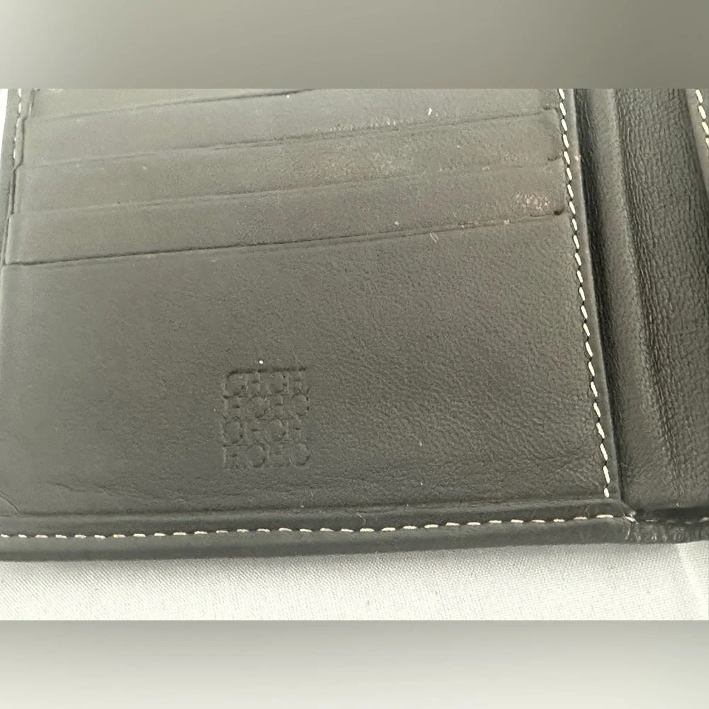 Carolina Herrera bifold canvas and brown leather bi fold wallet